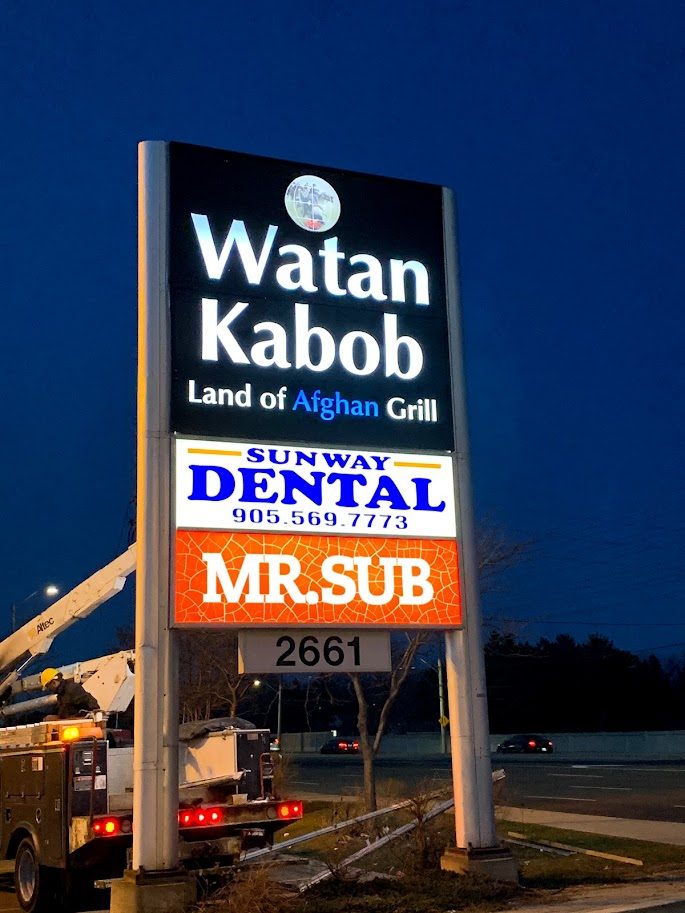 Watan Kabob illuminated pylon sign at night